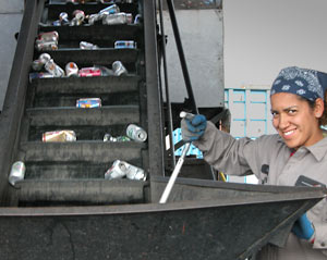 Woman processing cans