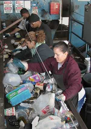 Workers sorting recyclables